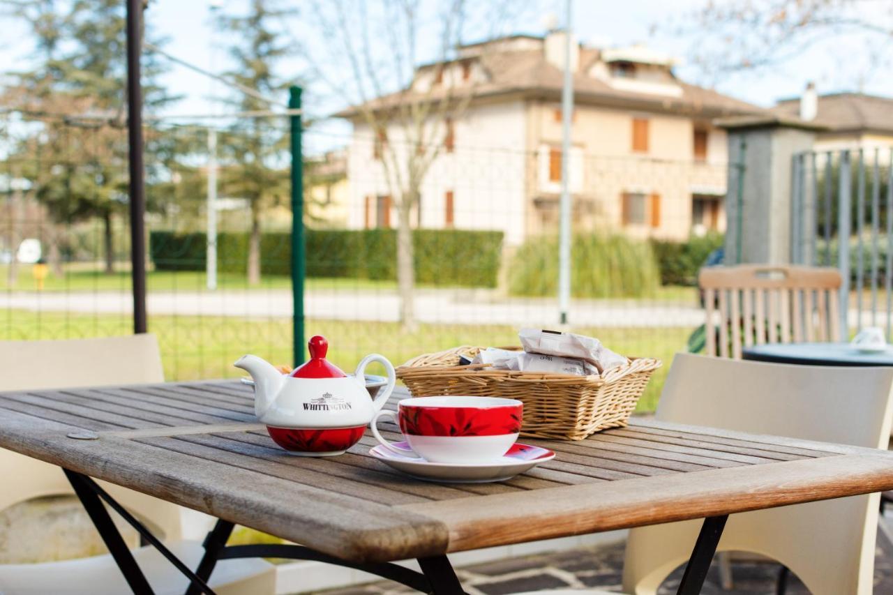 Casa Del Giardino Bright Apartment Бастия-Умбра Экстерьер фото